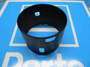 A non tilt steering column bearing top on a blue surface
