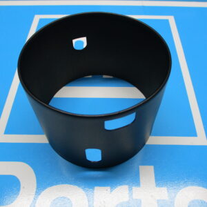 A non tilt steering column bearing top on a blue surface