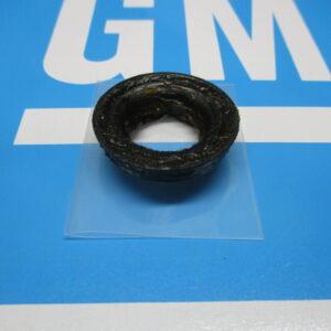 A bearing kept on a plastic sheet placed on a blue surface
