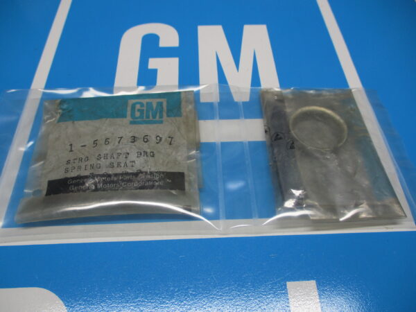 Two silver color components sealed in a plastic cover