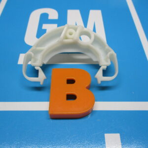 Alphabet B on a blue surface with white column part
